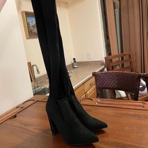 black over the knee, sock boots size 6. Very Stylish and Never worn